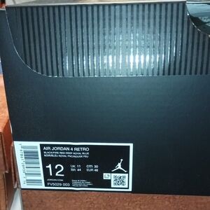 Nike Air Jordan 4 Retro - Black and Deep Royal Blue Rare Air Gold Lettering